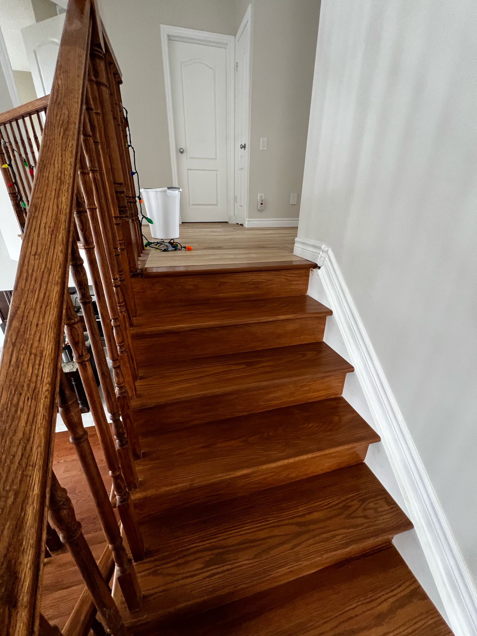 Straight Staircase Refinish & Hardwood Integration